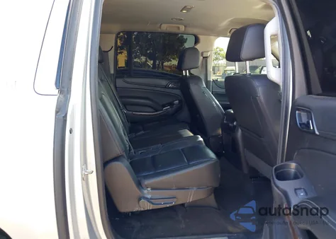 2018 Chevrolet Suburban Lt z USA, uszkodzony, nr VIN 1GNSCHKC6JR284115